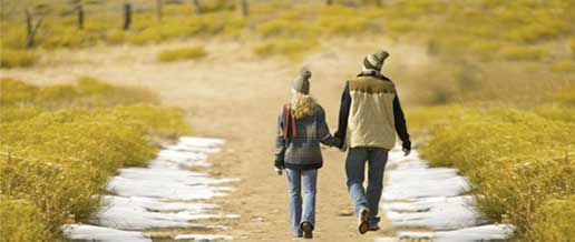 Couple walking holding hands